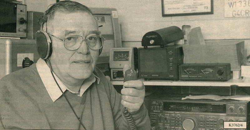 Lewis Kirby G4CRT holding microphone ready to transmit.