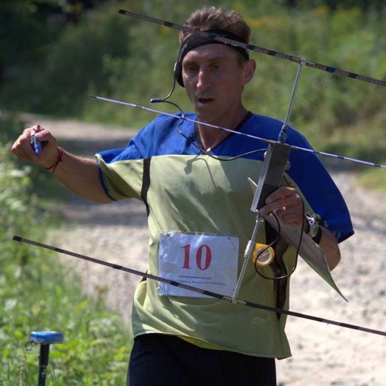 Man running whilst direction finding.